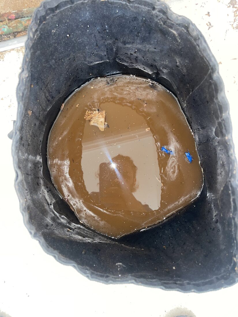 Powerflush by Silverdale Plumbing & Heating — magnetite sludge removed from a central heating system
