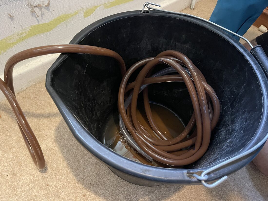 Powerflush by Silverdale Plumbing & Heating — magnetite sludge removed from a central heating system