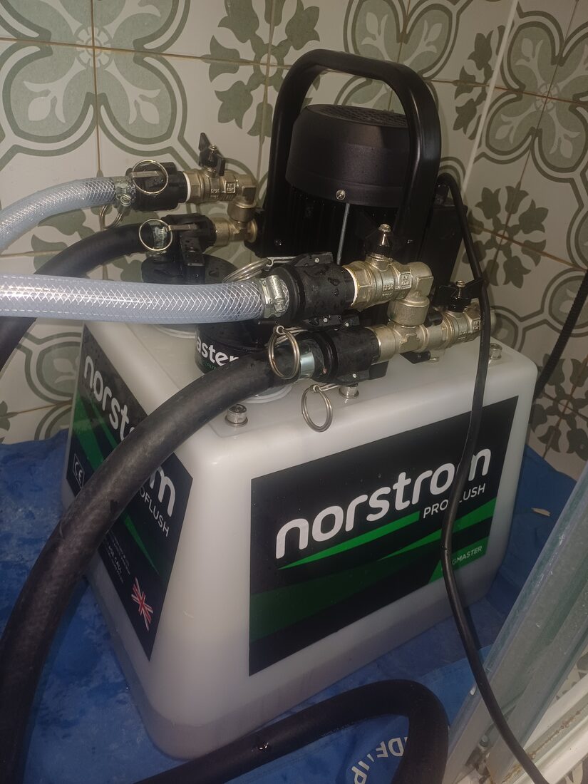 Powerflush by Silverdale Plumbing & Heating — magnetite sludge removed from a central heating system
